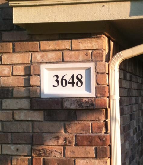 house numbers on brick